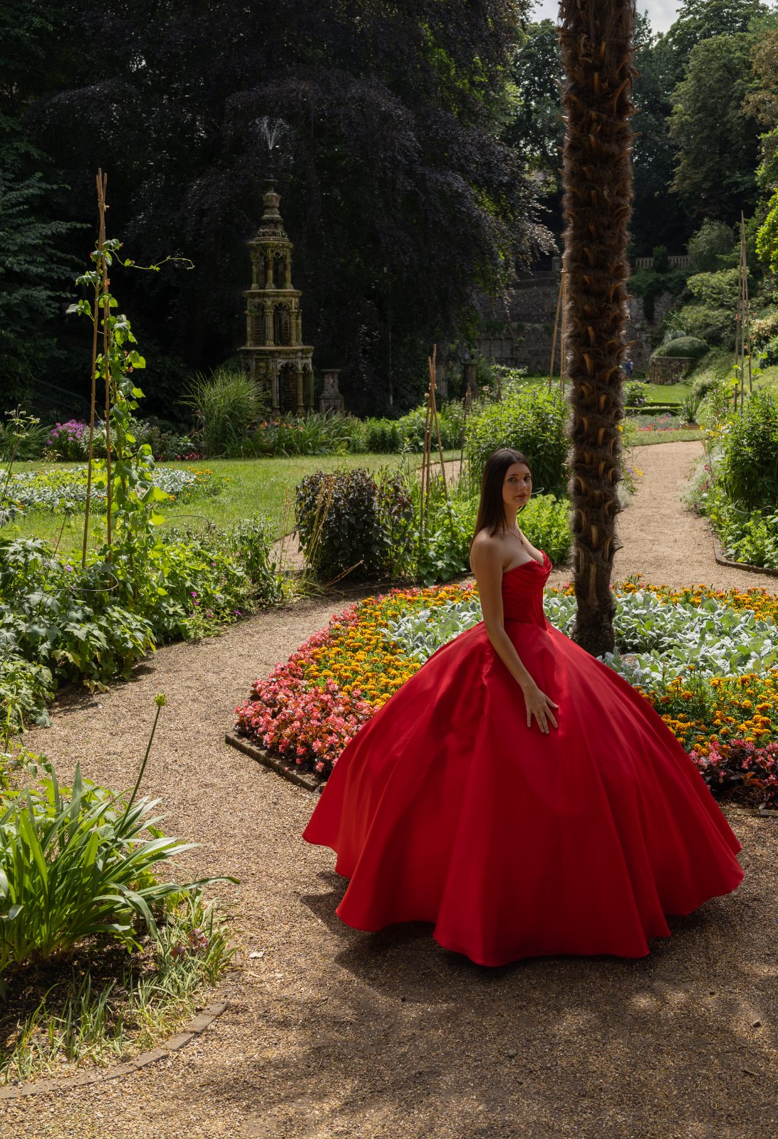 Prom portrait in a red ball gown, Plantation Garden